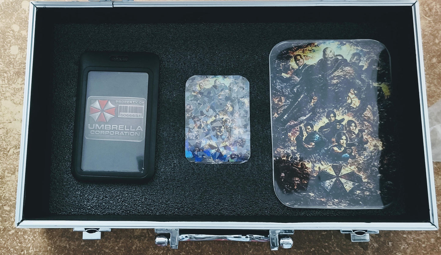 Umbrella Corporation Collector Case – Resident Evil Maletín Coleccionable con Gafete y Stickers