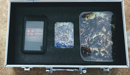 Umbrella Corporation Collector Case – Resident Evil Maletín Coleccionable con Gafete y Stickers